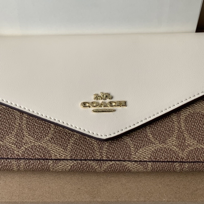 SOFT WALLET IN COLORBLOCK SIGNATURE CANVAS (COACH 31547)