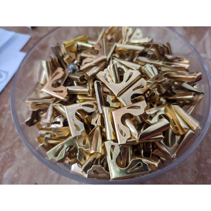 Pengaman pojokan kitab / pojokan kitab