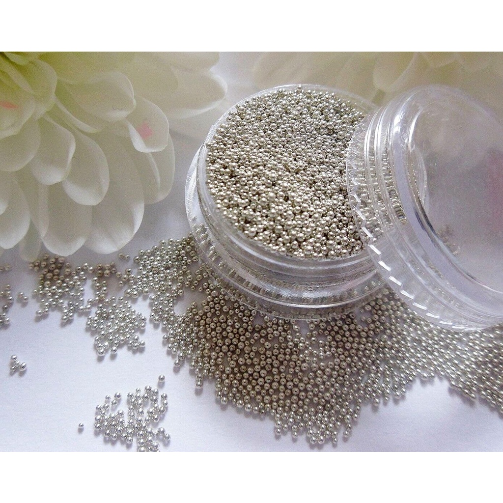 

Sprinkle Spikel Trimit SILVER Pearl MINI 100 gr - Hiasan Kue