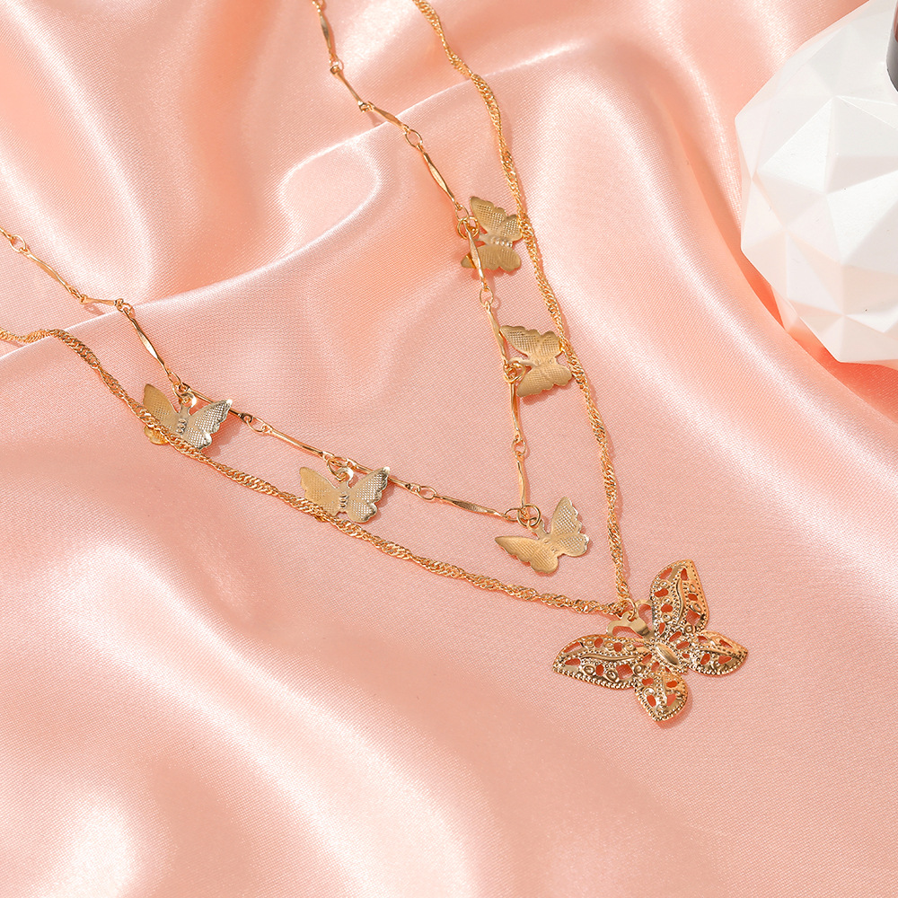 Retro Sederhana Enam Kalung Butterfly Lima Fashion Korea Mengosongkan Rantai Clavicle Wanita Empat Musim Perhiasan Kupu-kupu Yang Indah