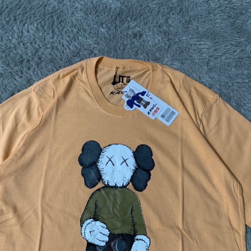 Kaos Tshirt Uniqlo X Kaws Holding Orange Pastel Fulltag