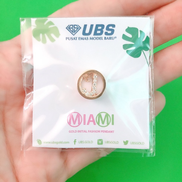 Charm Liontin Miami UBS - J