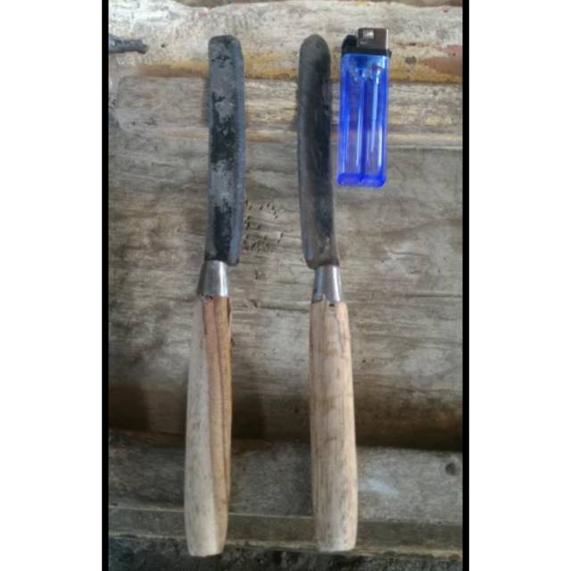 Pisau iris bahan plat baja