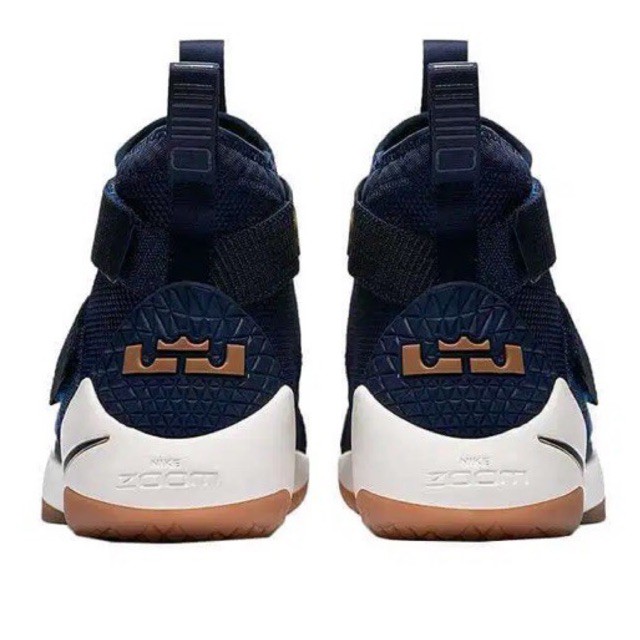 white lebrons with strap