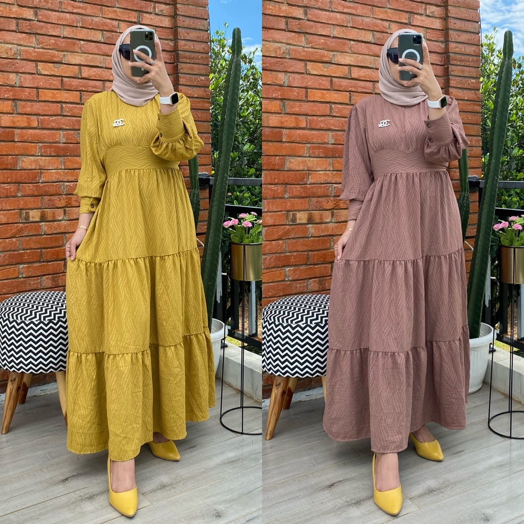 DRESS QORY Dress Qory Bahan :  • Bahan : Cringkle Embos • Ziper depan , Busui friendly  Lingkar Dada