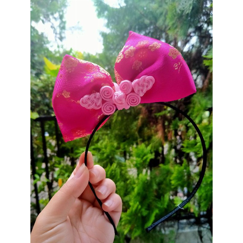 bando kancing Imlek fanta