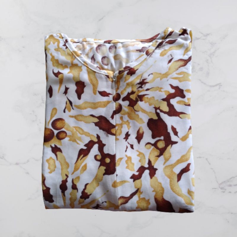 Baju stelan wanita masa kini