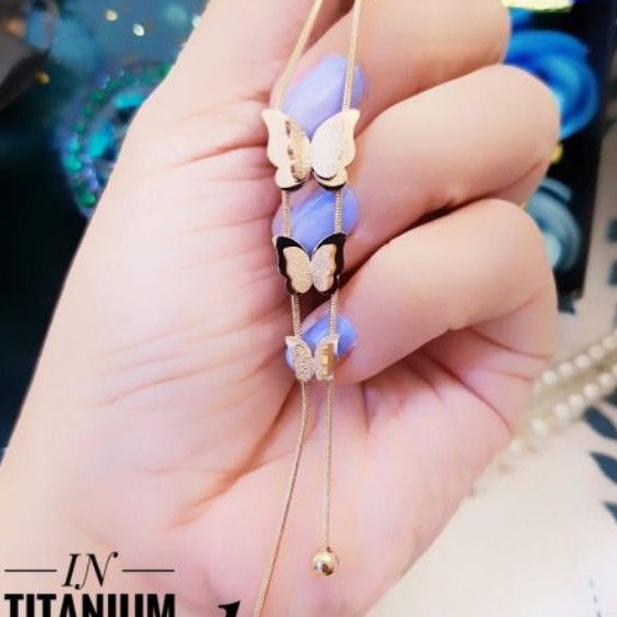 Titanium kalung kupu y5