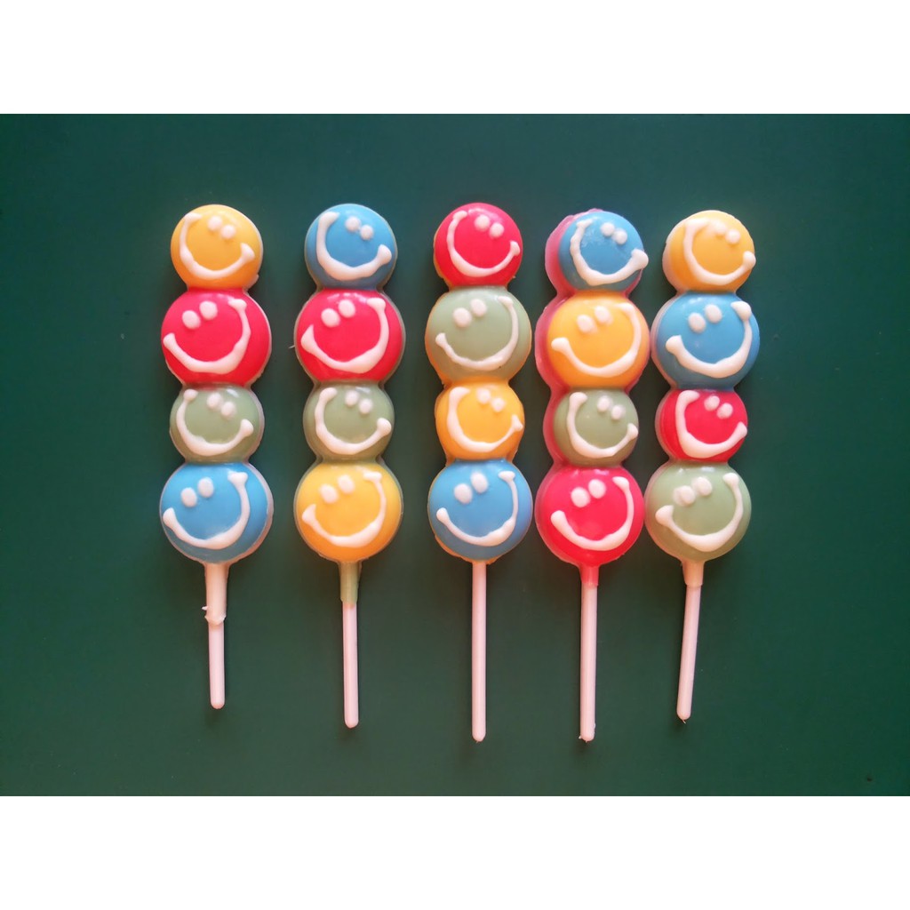 

cokelat praline motif smile stick/lolipop