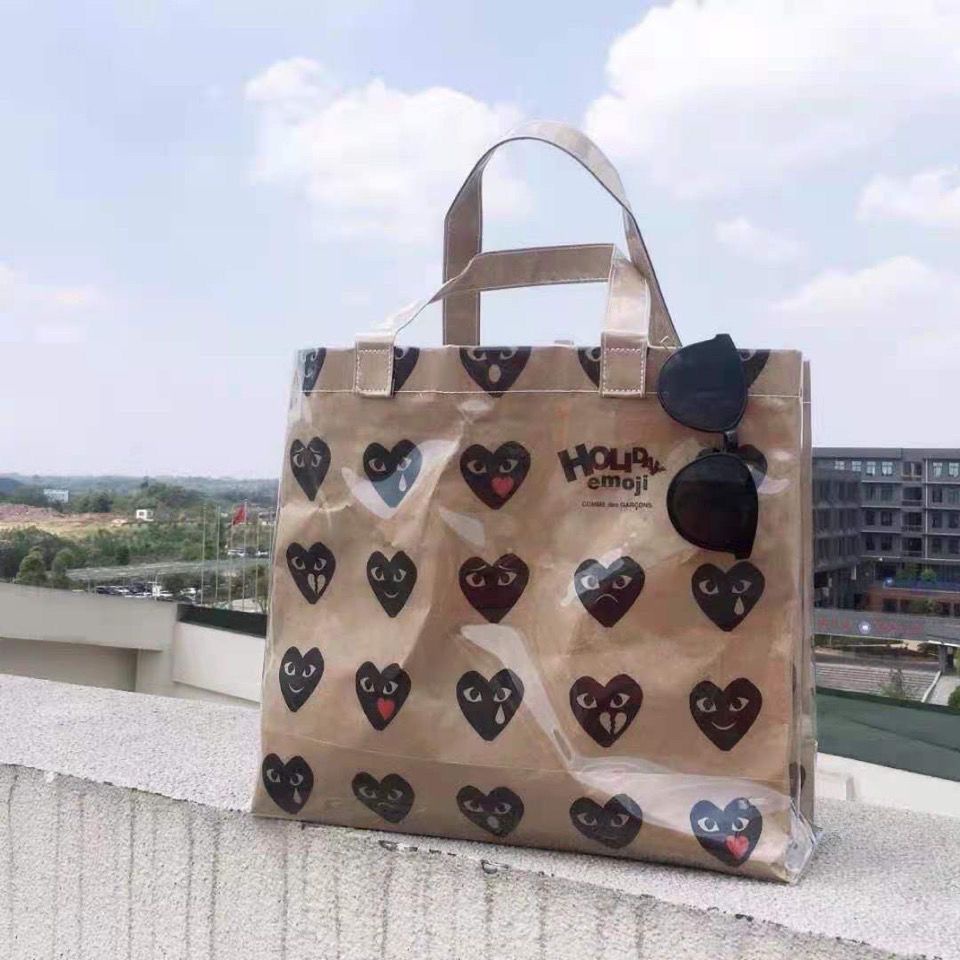 Sera trendy all-match one-shoulder heart handbag PVC transparan tas belanja kertas kraft berkapasitas besar siswa tote bag