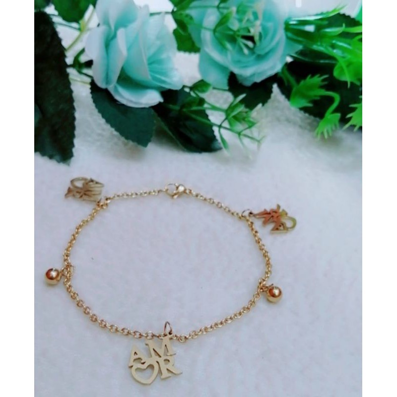 Gelang wanita TITANIUM GOLD BERMACAM MOTIF PILIHAN