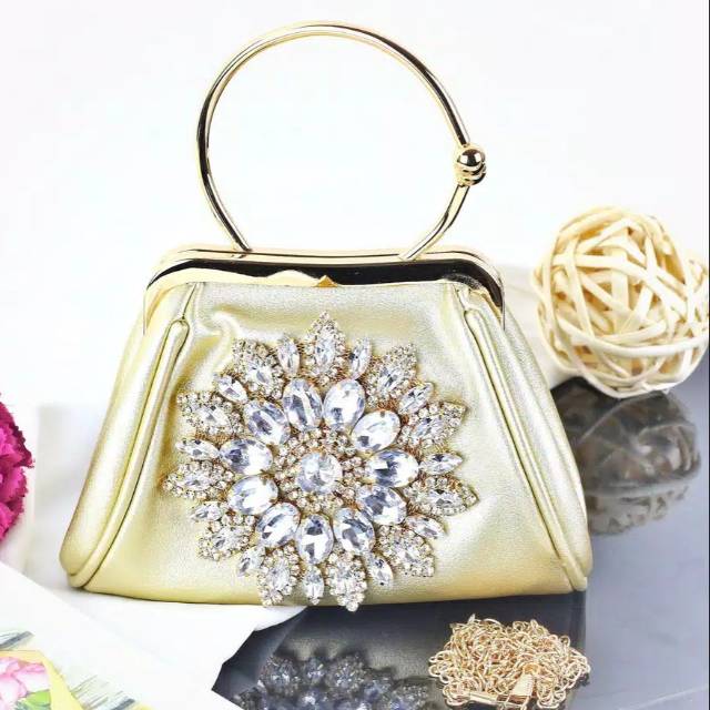 tas pesta behel magnet kristal matahari permata berlian trapesium gold kulit sintetis peach  kebaya