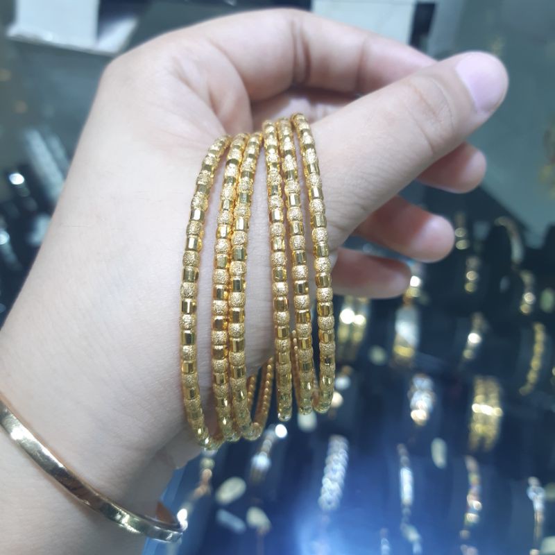 Gelang emas kerincingan bambu