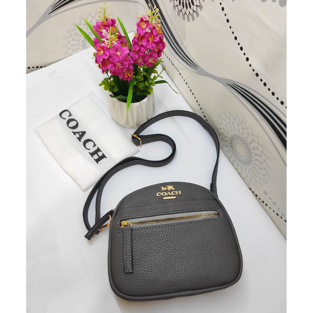 Coach Oval Mini / Tas Slempang Wanita Bahan Toggo