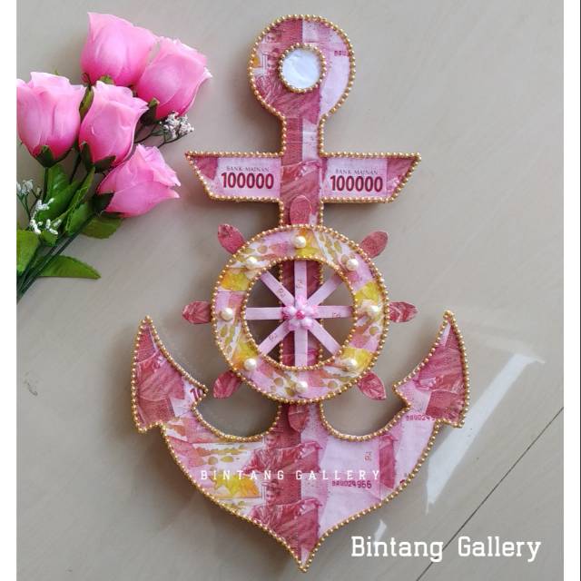 Mahar jangkar dan kemudi / miniatur jangkar dan kemudi kapal