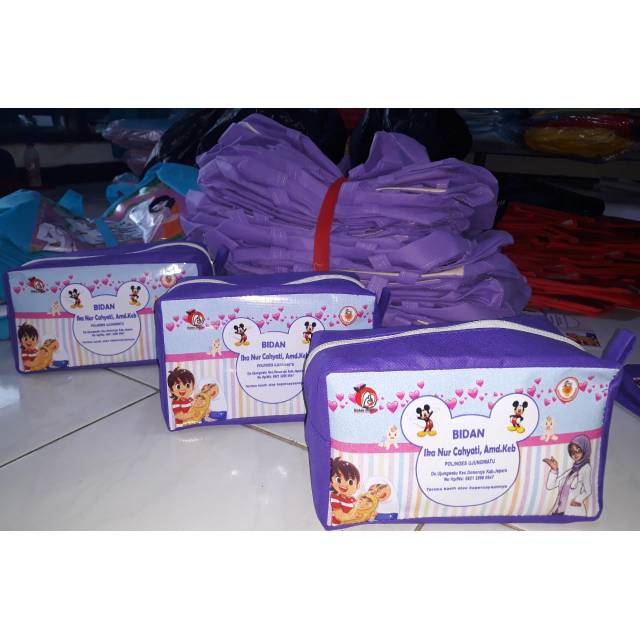 

Dompet souvenir bidan model pakai lebar gambar bidan