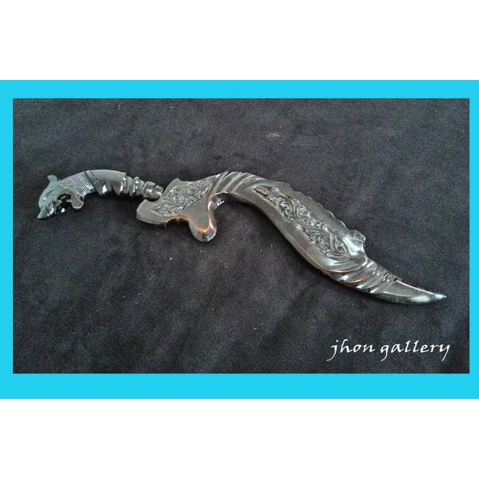 kujang ukir kepala macan