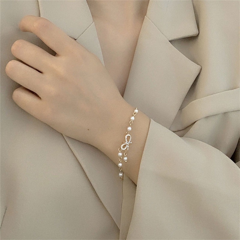 Gelang Korea Fashion Busur Mutiara Hias Berlian Imitasi Bangle Liar Aksesoris Fashion-Won