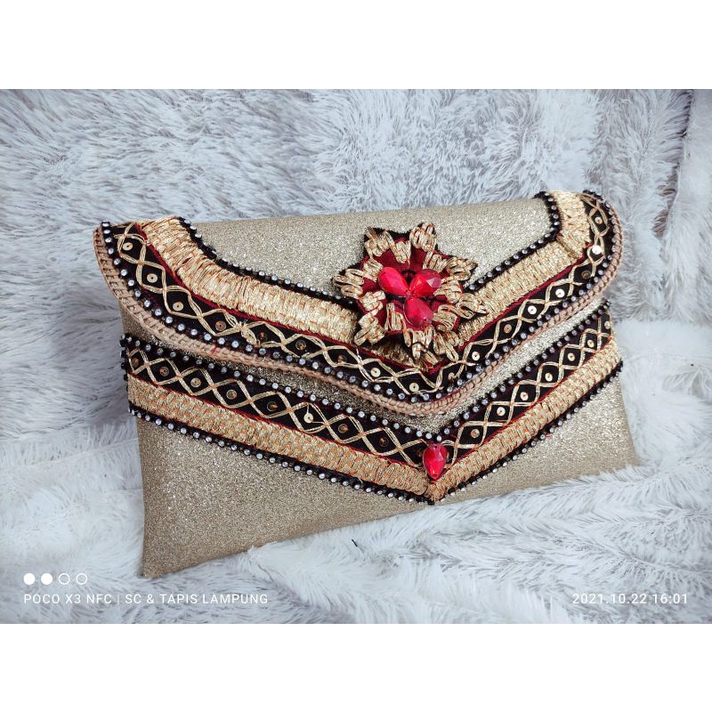 clutch gliter tapis / tas tapis