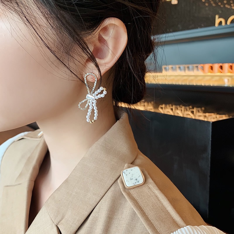 Anting 925 Silver Needle Bentuk Pita Aksen Zircon Gaya Korea Untuk Wanita