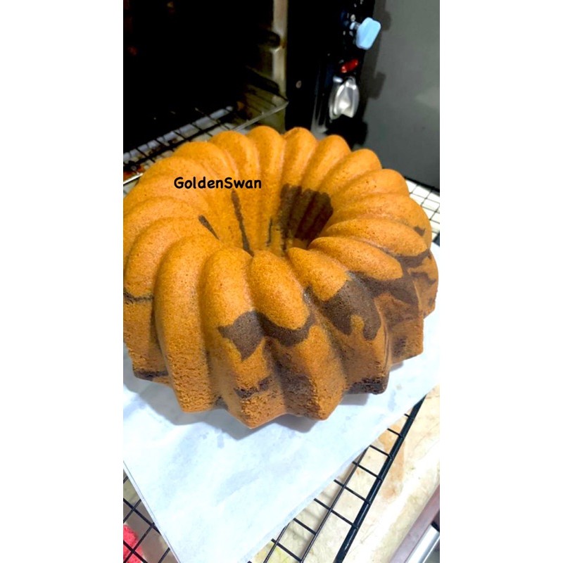 

Kue Bolu Macan Bolu Tape
