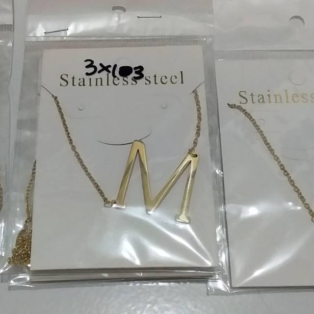 Kalung huruf M