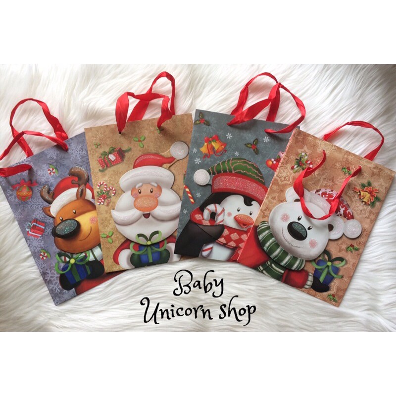 

Paper bag berkarakter Lucu tebal Kemasan Glitter size M ( 17,5 cm x 7,5 cm x 23,5 cm )