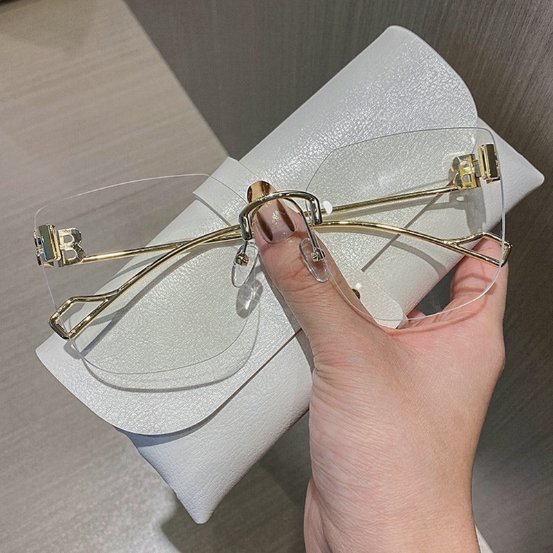 Kacamata Hitam Oversize Tanpa Bingkai Gaya Retro Untuk Wanita