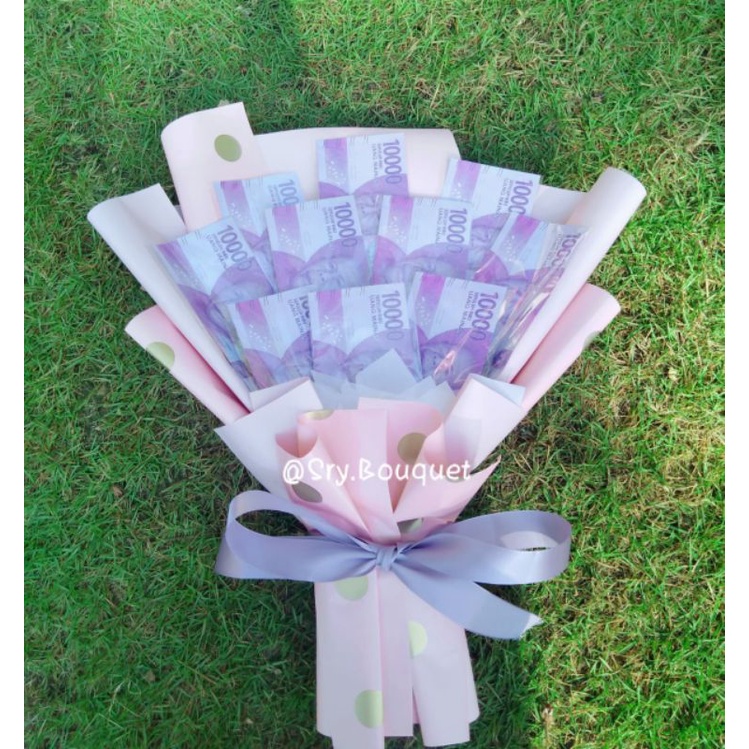 

Buket uang palsu 10 lembar