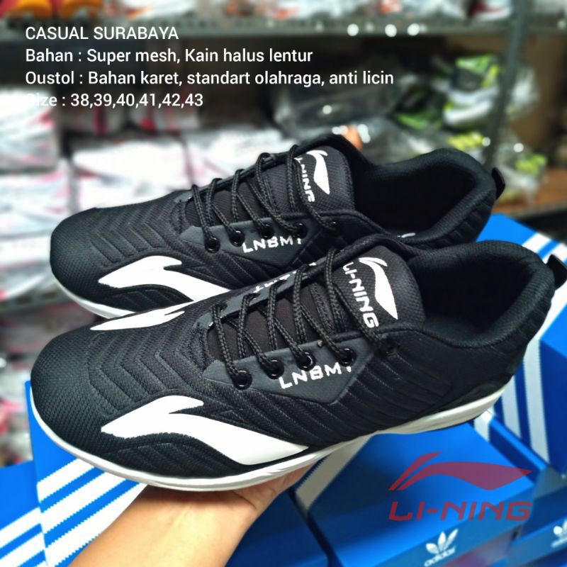 Sepatu Olahraga Badminton Li-Ning Bahan Karet Hitam Putih