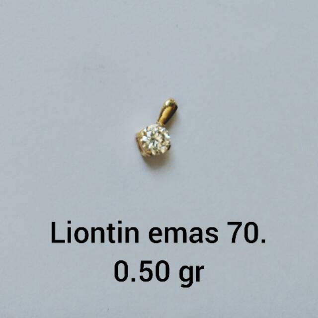Liontin emas 700 berat 0.5 gr