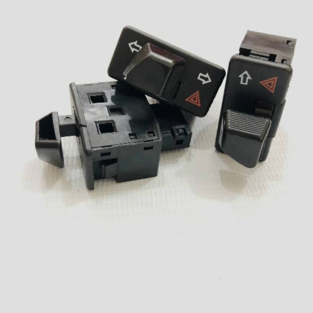 Tombol lampu hazard beat touring