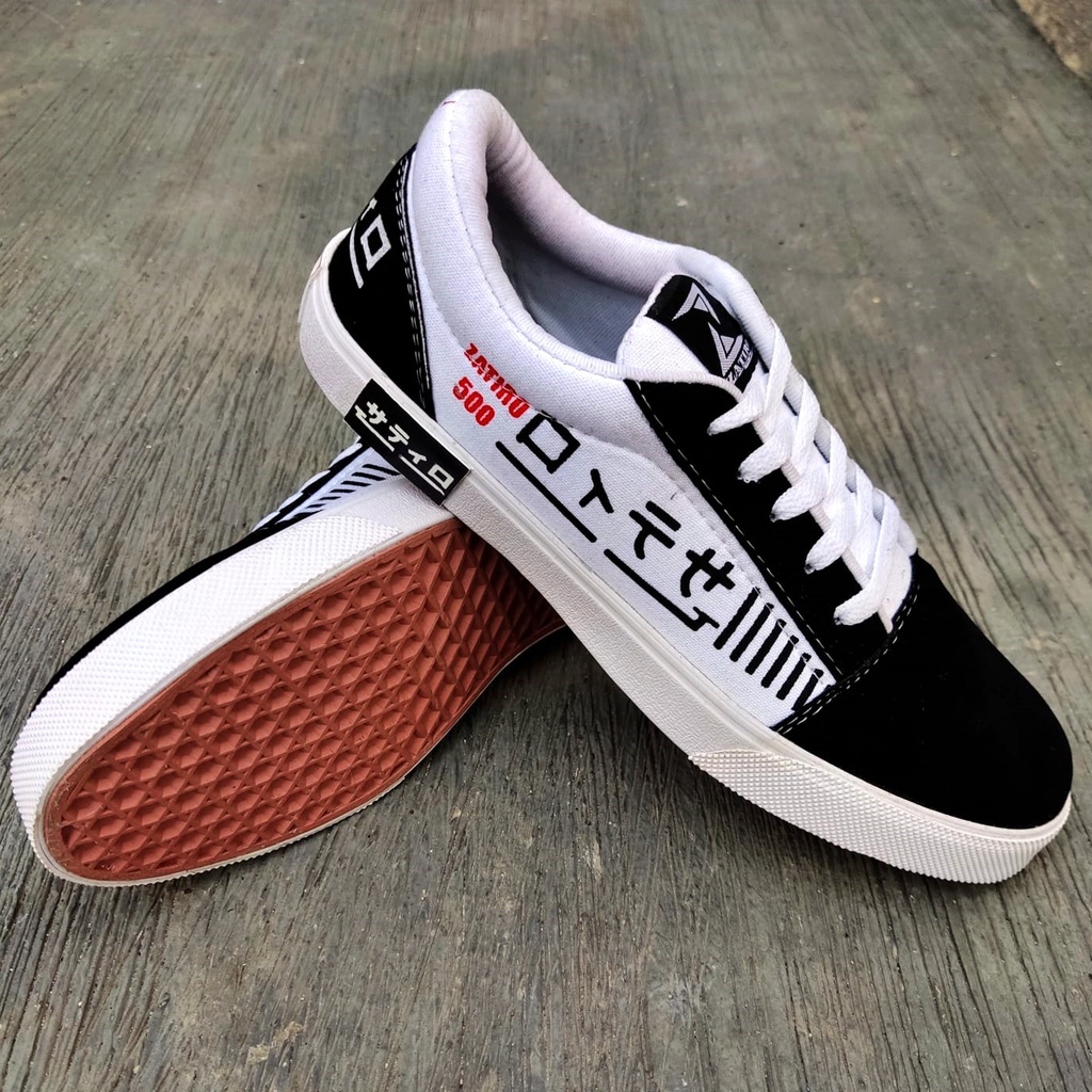 Sepatu Sneakers Unisex putih pria kets Casual Santai Jalan Traveling spatu hitam putih gaya sporty kasual brand lokal murah