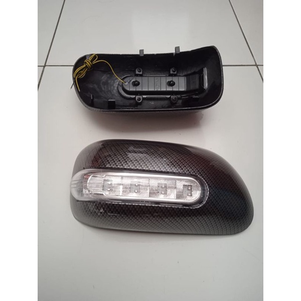 COVER SPION LAMPU AVANSA LAMA VVTI CARBON ( MODEL GANTI)