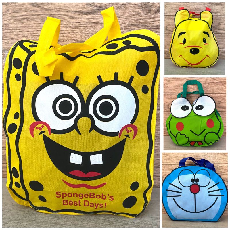 

Tas Spunbond Karakter Doraemon, Pooh, Spongebob, Frog