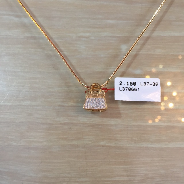 liontin tas full mata 375