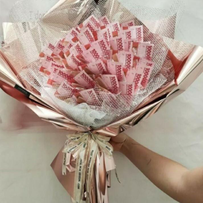 ➣ uang 100 ribu ➯