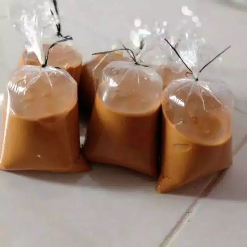 

A000 Petis / pettes Ikan Tuna kualitas super asli Madura - Bumbu Rujak pettis Pamekasan 50gr