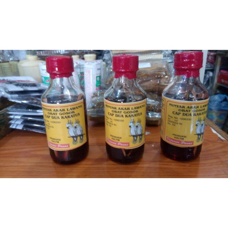 Minyak urut akar lawang obat gosok cap dua kakak tua  (free bubble wrap)