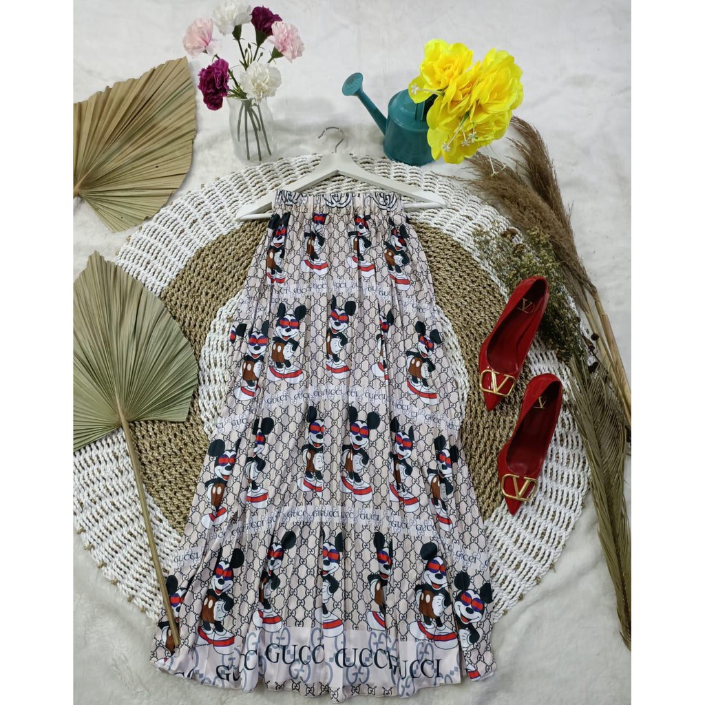 rok plisket motif gucci bahan import