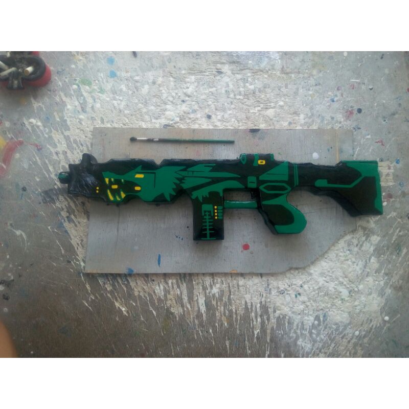 Senjata mainan anak skin ff Titan Naga