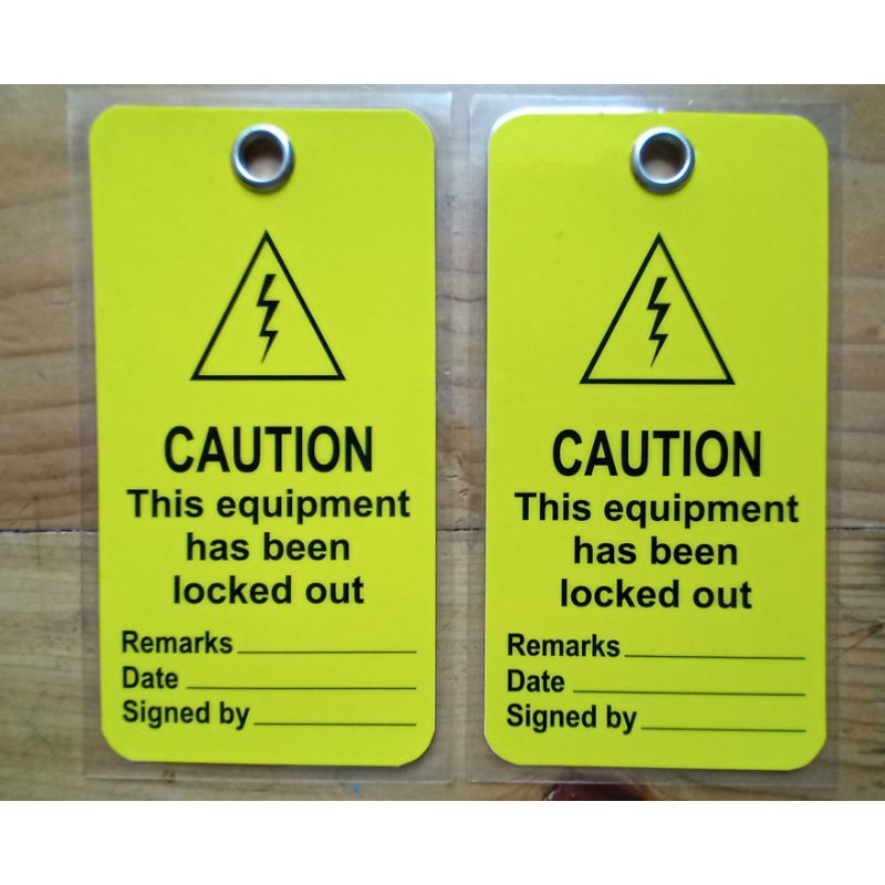 SAFETY TAG LOTO Caution This Equipment has been Locked Out