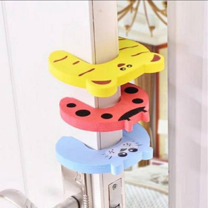 Penjepit Pintu / Ganjal Pintu /Door stopper Bahan Karet