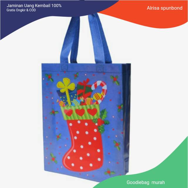 

tas sukuran tas natal murah ukuran 32x25x9 / goodiebag / goodiebag murah / tas spunbond /tas spunbond murah goodiebag murah