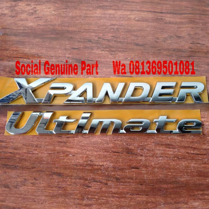 emblem logo bagasi tulisan Xpander dan ultimate