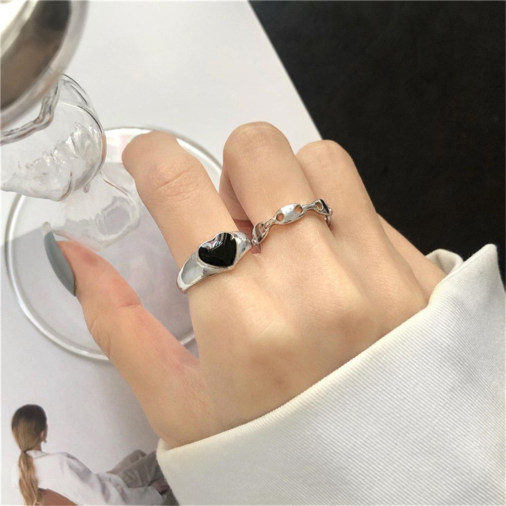 2pcs Cincin Jari Telunjuk Desain Hati Hitam Model Hollow Warna Silver Untuk Aksesoris