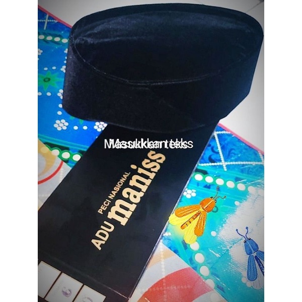 peci songkok adu manis