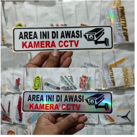 

TERLARIS STICKER AREA DI AWASI CCTV CUTTING STIKER