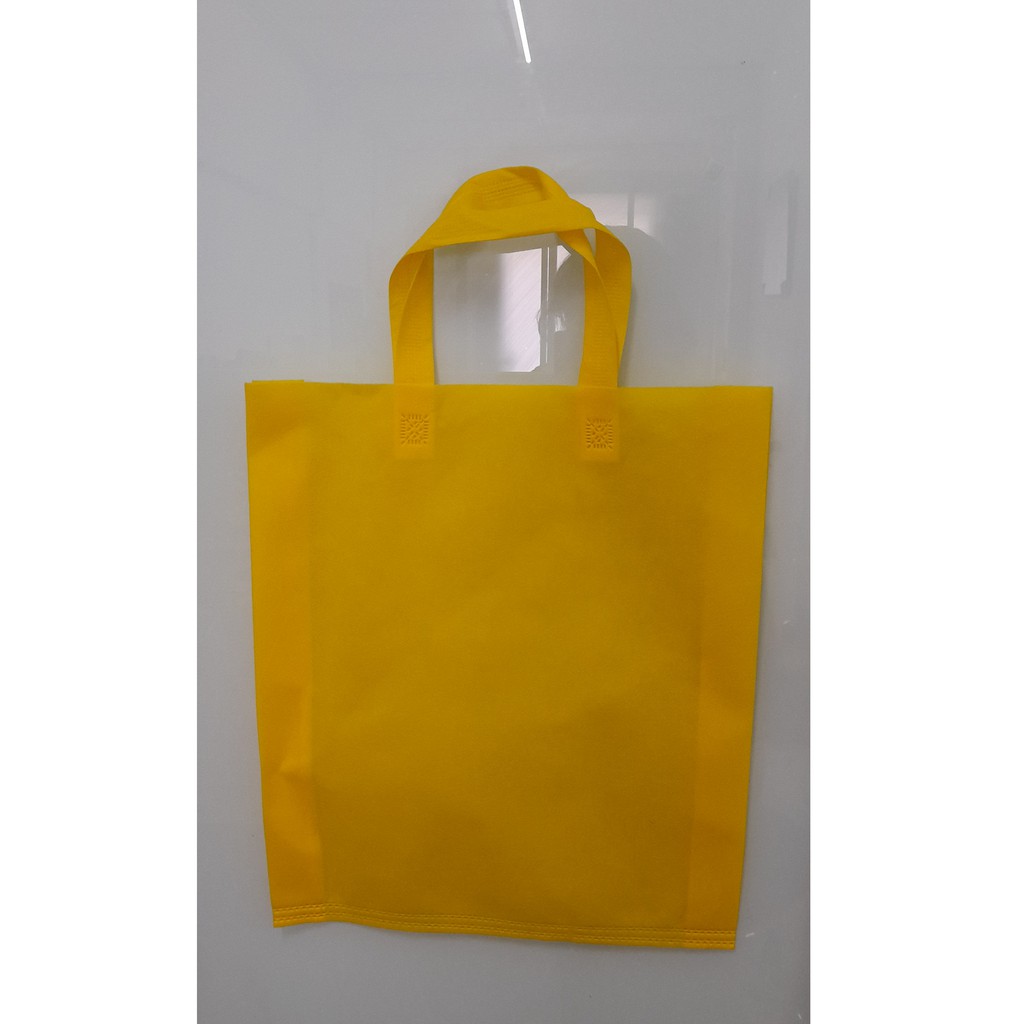 

(Lusin) Tas Press Spunbound Tali Goodie Bag Tas Belanja Warna Kuning 38 cm x 45 cm