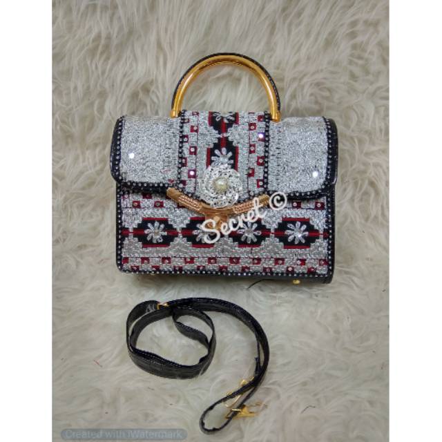 Tas pesta tapis lampung inces silver bintang